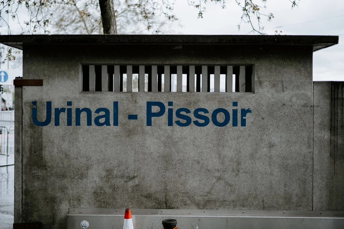 a grey building with blue text