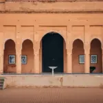 Courtyard with arched doorways and framed art