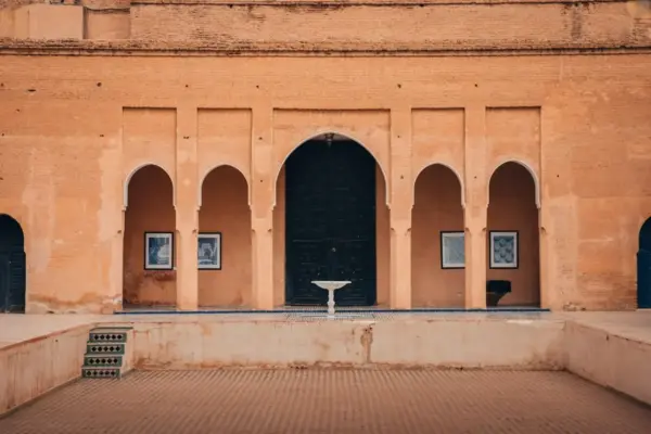 Courtyard with arched doorways and framed art